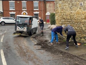 Flood wardens clearing drains